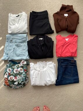 9 piece Suduko wardrobe/packing. Size 12 bottoms, large dress & large tops.